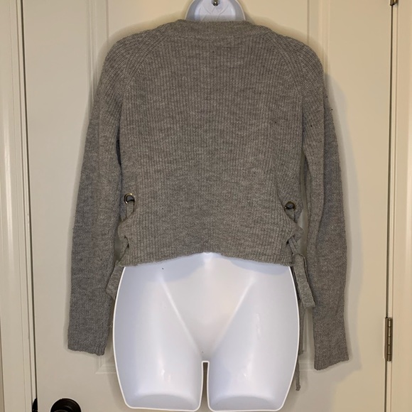 Grey cropped sweater with ties on the sides. - Picture 2 of 6